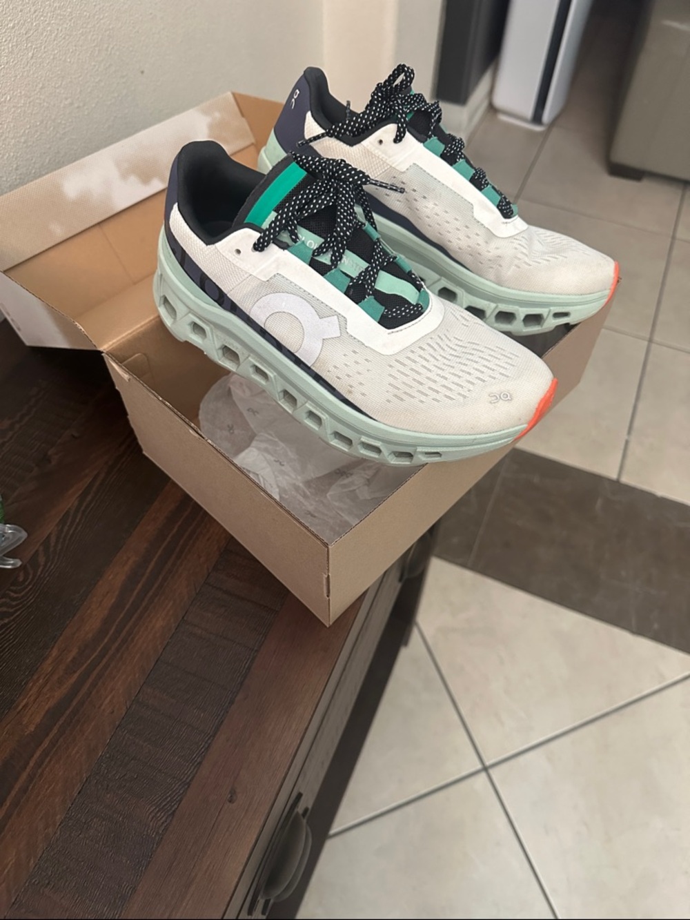 On Running Sneakers in White, Mint, Black, and Coral Accent